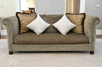 Contemporary Upholstered Loveseat With Rolled Arms And Custom Pillows