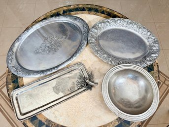 Four Silver Serving Trays