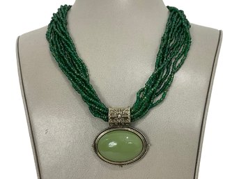 Green Multi Strand Bead Necklace With Pendant