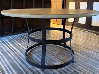 Round Table With Concrete Top And Sculptural Metal Base