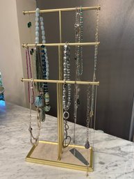 Various Necklace Collection Including Beaded And Chains With Stand