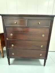 Mahogany Tall Chest Of Drawers With Fluted Legs And Brass Pulls