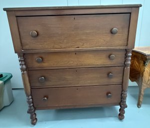 Turned-Leg Four-Drawer Dresser With Round Wooden Knobs