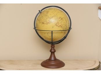 Glove On Wood And Iron Pedestal