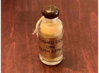 A Small Jar Of Crushed Gold Ore From South Africa