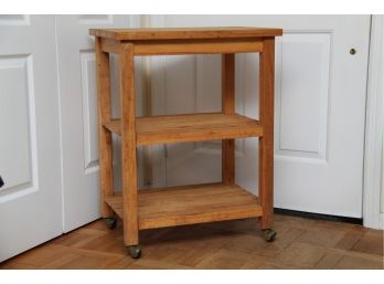 A Butcher Block Top Rolling Kitchen Cart