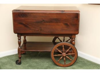 An Oak Tea Cart With Drop Side Leaves