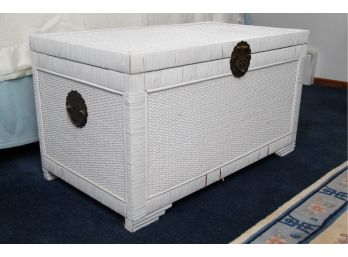 A White Wicker Storage Trunk