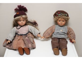 Two Porcelain Face Dolls