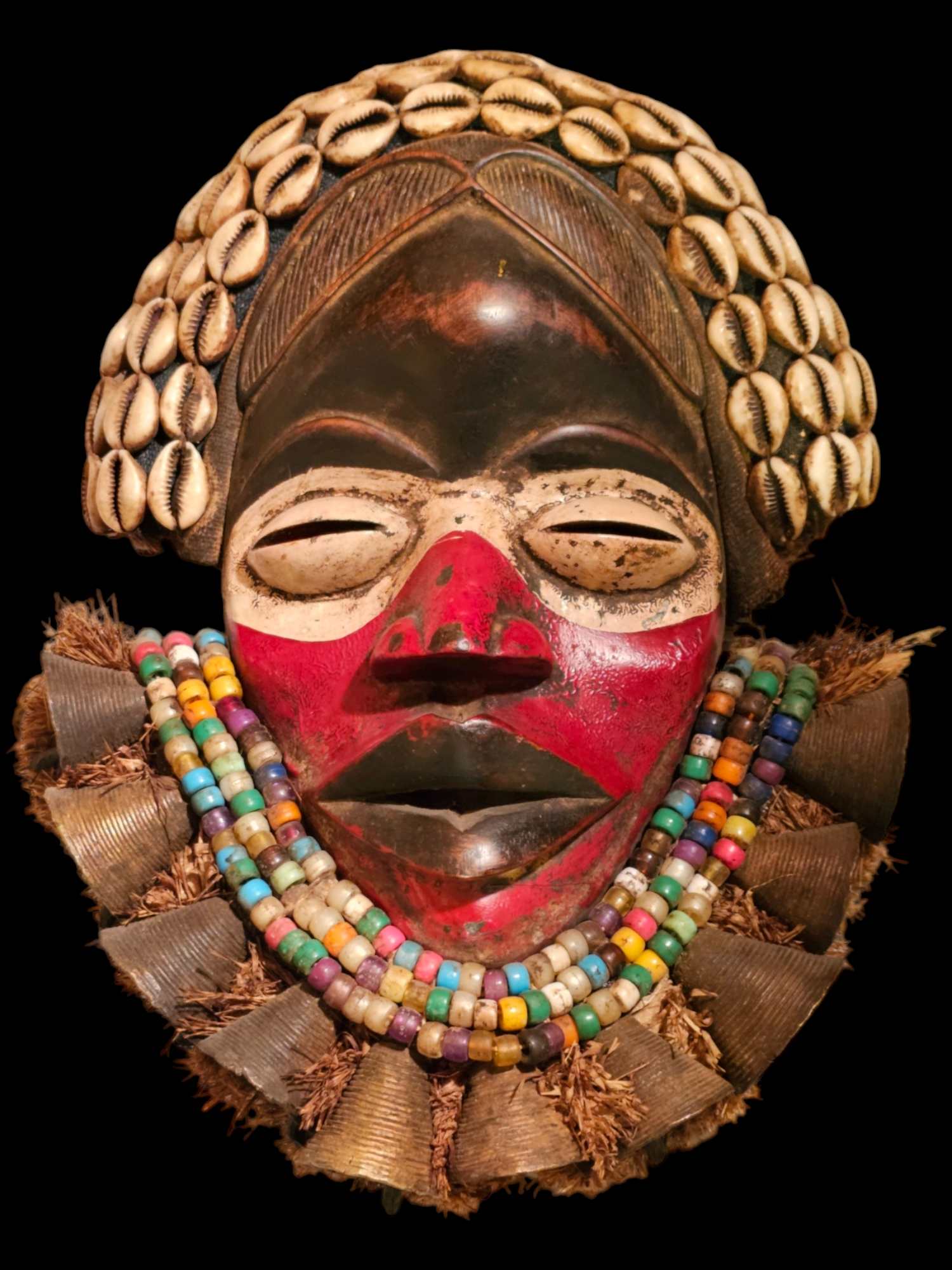 African Ceremonial Dan Tribal Mask. Carved Wood With Shells, Colorful