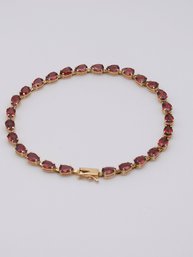 Charming 14k Gold Garnet Bracelet