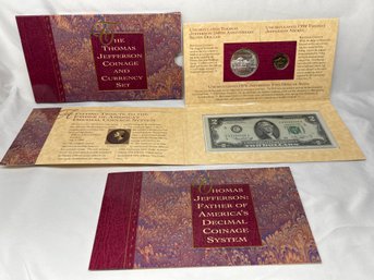 Thomas Jefferson Coinage And Currency Set Incl. Uncirculated Silver Dollar, With Certificates Of Authenticity