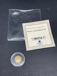14K/.585K Gold Mini Coin, 0.5g, Historic Eagle Dollar Trial, American Mint COA