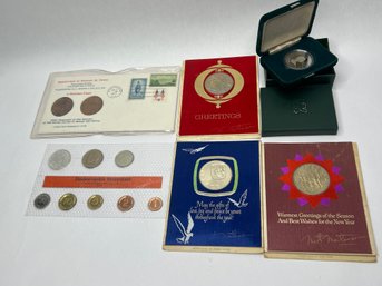 Variety Of Collectible Coins And Medals In Cases Or Sleeves
