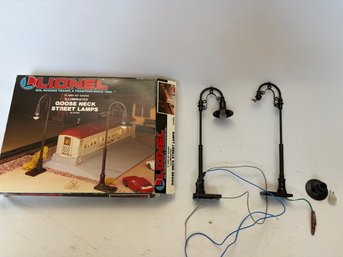 Two Lionel Lamp Posts (One Seems Broken)