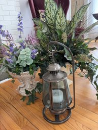 Two Faux Plants And Lamp