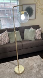 Brass Arched Floor Lamp With Clear Glass Globe Shade