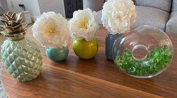 Four Vases And A Pineapple