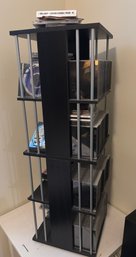 Revolving CD Rack With CDs