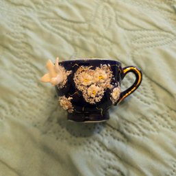 Antique Porcelain Tea Cup W/a Cobalt Blue Glaze With Gold Trim And Three-dimensional Floral And Bird Deco. SH