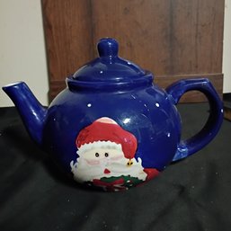 Vintage Ceramic Teapot Features A Hand-painted Snowman Design On A Blue Background (NM)