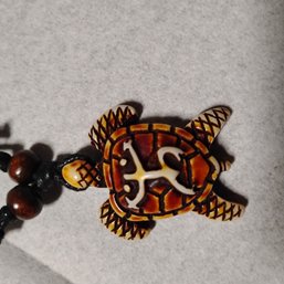 Sea Turtle Pendant Necklace, Crafted From Resin To Mimic Carved Bone Or Coconut Shell(NM)