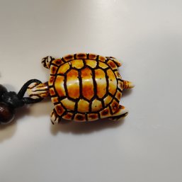 Sea Turtle Pendant Necklace, Crafted From Resin To Mimic Carved Bone Or Coconut Shell (NM)