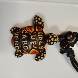 Cabo Verde Turtle Pendant Necklace Featuring A Hand-carved Turtle Design On A Cord (NM)