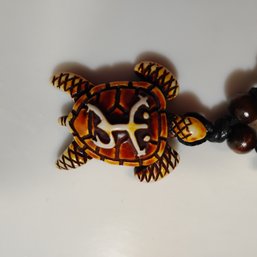 Hawaiian Or Tribal-style Turtle Pendant Necklace, Typically Made Of Artificial Resin  (NM)