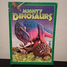Hardcover Book Mighty Dinosaurs By Christina Wilsdon, Published By Reader's Digest.  2005 (BT)