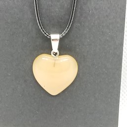 Glass Heart Pendant In Cream Color  On Black Faux Leather Adjustable Cord (NM)
