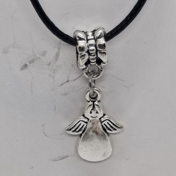 Silver-toned Charm Necklace With An Angel Pendant On A Black Cord (NM)