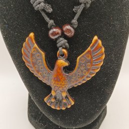 Brown Resin Tribal Eagle Necklace Pendant On An Adjustable Black Cord With Wood Beads  (NM)