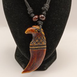 Brown Resin Eagle Head And Talon Necklace Pendant On An Adjustable Black Cord With Wood Beads  (NM)