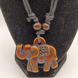 Brown Resin Elephant Necklace Pendant On An Adjustable Black Cord With Wood Beads  (NM)