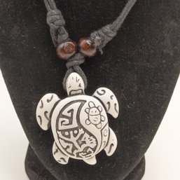 White Resin Carved Tribal Style Sea Turtle Pendant On A Black Adjustable Cord Necklace With Wooden Beads (NM)