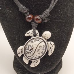 White Resin Carved Tribal Style Sea Turtle Pendant On A Black Adjustable Cord Necklace With Wooden Beads (NM)