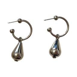 Tear Drops Are Faalllling Silvertone Huggie Earrings