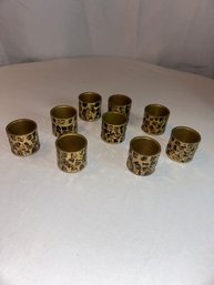 Lot 52: 9 Napkin Rings / Earth Tones Metallic