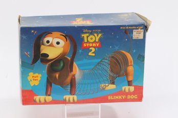 Toy Story 2 Slinky Dog Pull Toy Still In Its Original Box.