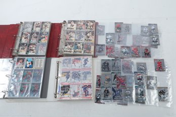 Four Hockey Binders With 9 Pocket Pages And Hockey Cards