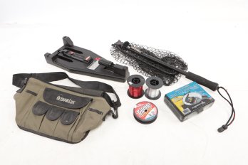 Assorted Fishing Lot: Lures, Net, Lines Etc.