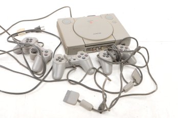 Sony Play Station Consol W/ Controls And Cords  Untested But Owned By An Adult Collector.