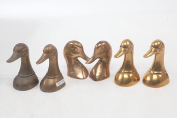 Three Matching Sets Of VINTAGE BRASS DUCK HEAD BOOKENDS