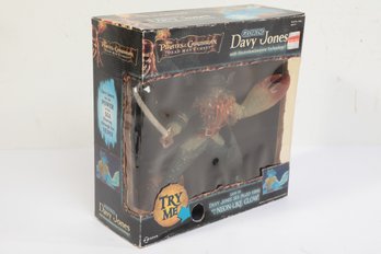 DISNEY PIRATES OF THE CARIBBEAN DEAD MANS CHEST GLOWING DAVY JONES FIGURINE
