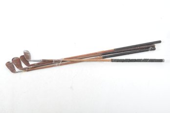 Grouping Of 4 Wood Shaft Golf Clubs