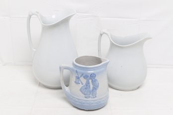 Antique Blue And White Salt Glazed Stoneware Pitcher Together With Two White Ironstone Pitchers