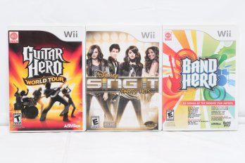 3 Nintendo Wii Games: Guitar Hero World Tour, Disney Sing It Part Hits & Band Hero
