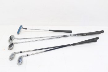 Group Of Golf Irons And Putters