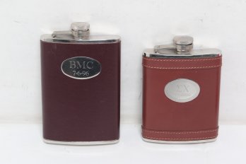Two Metal And Leather Hip Flasks